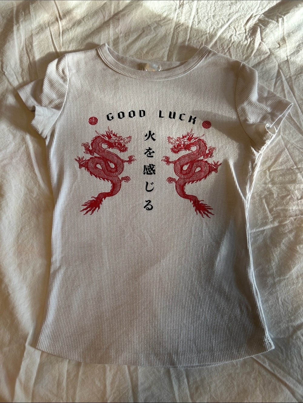 White baby tea, good luck, black and red dragons